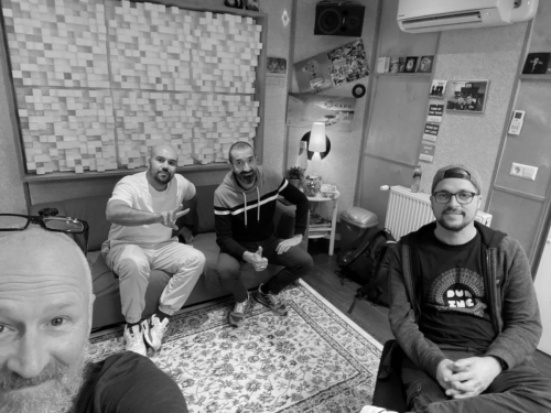 Dub Inc band members in the studio